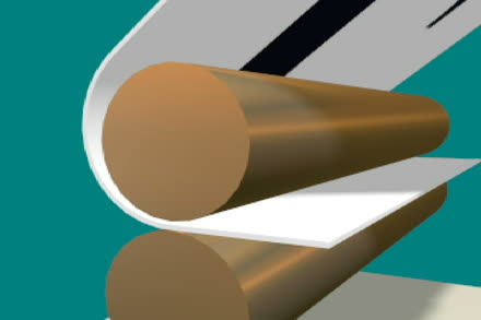 Paper passing the fuser rollers inside a laser printer
